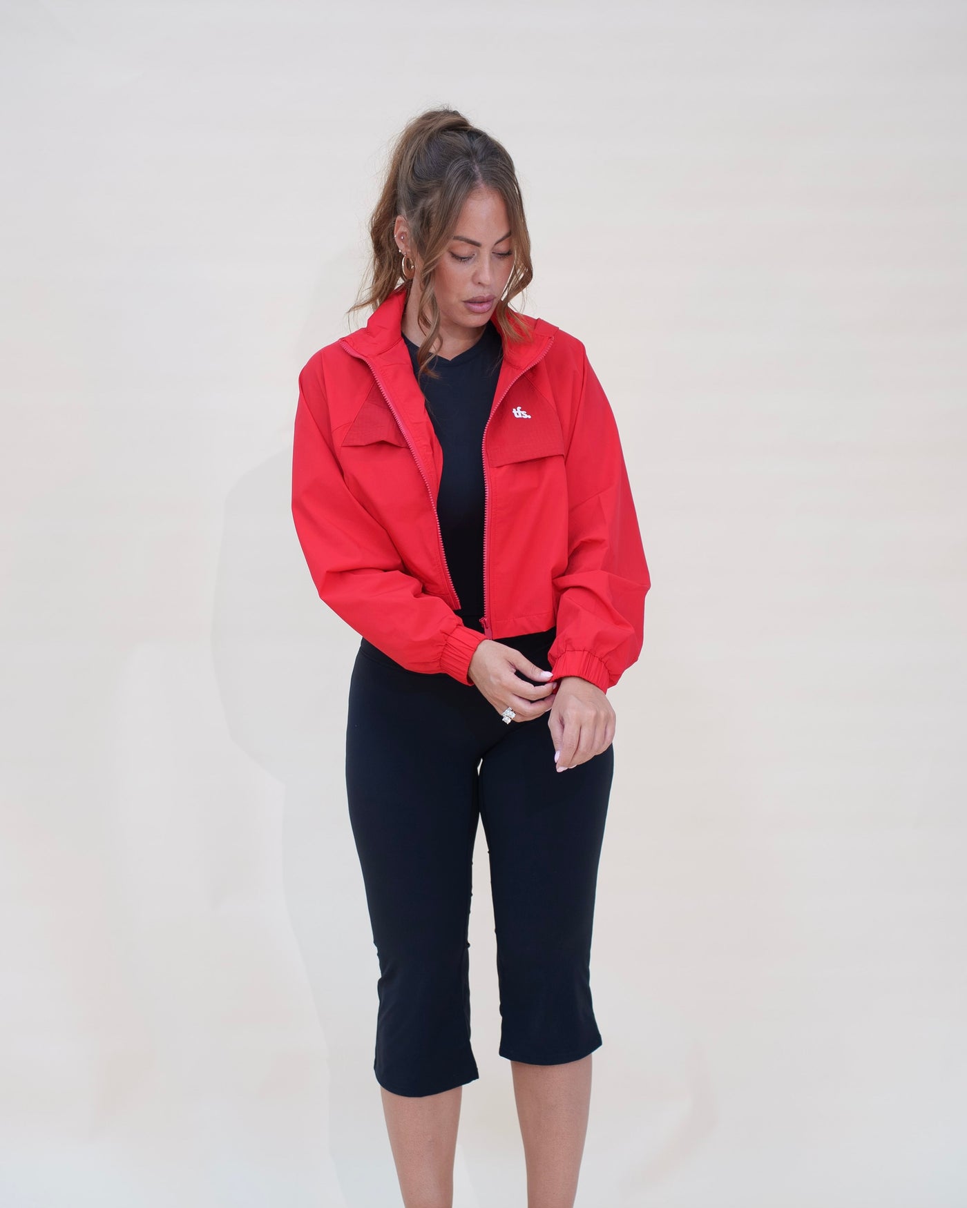 The Bomber — veste crop zippée femme The Fit Society