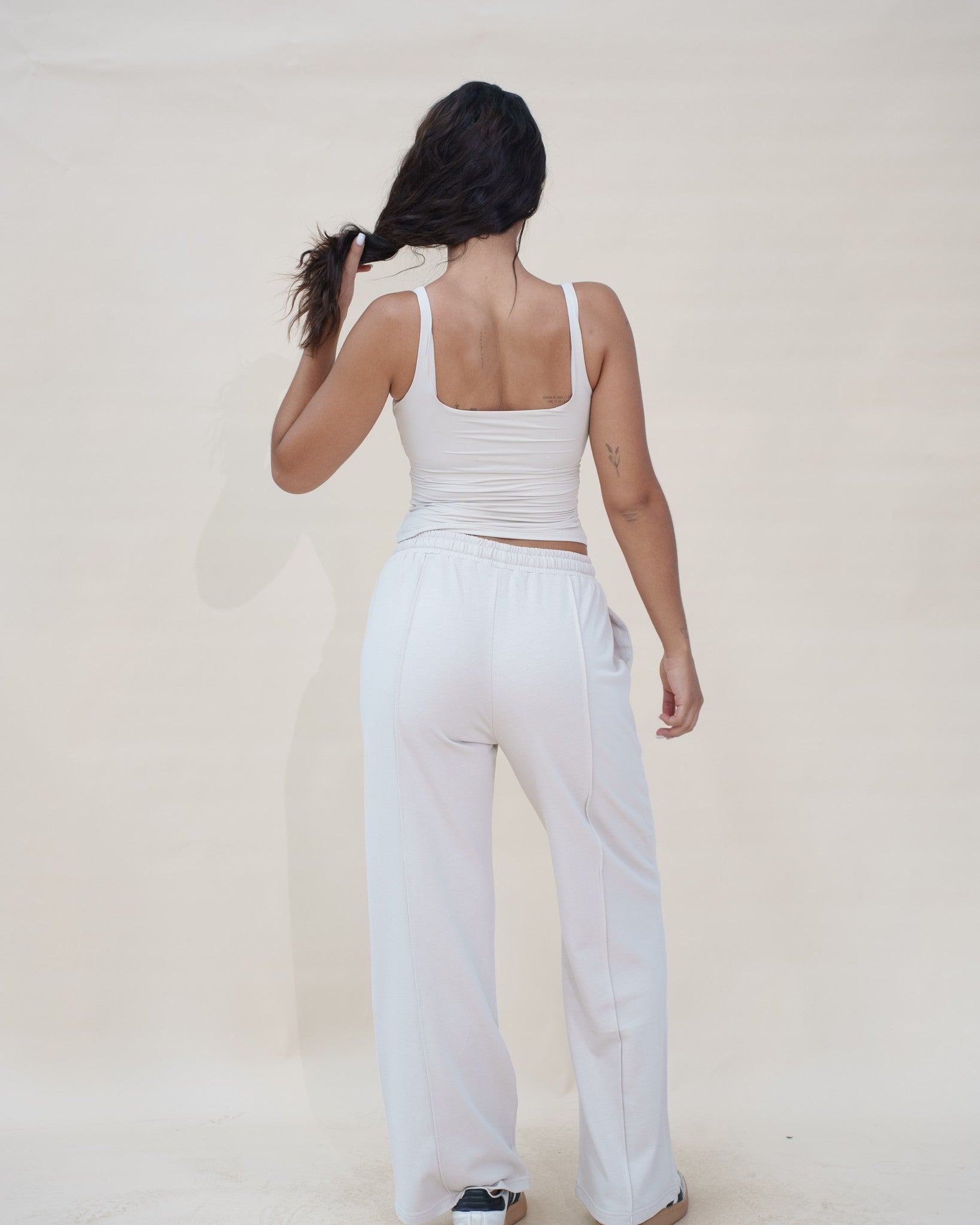 The Uniform Top — débardeur côtelé femme The Fit Society, crème, de dos